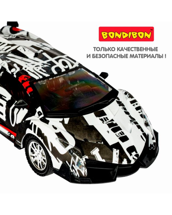 Инерционная машинка. Парк техники. Спортивная машина, чёрно-белое граффити