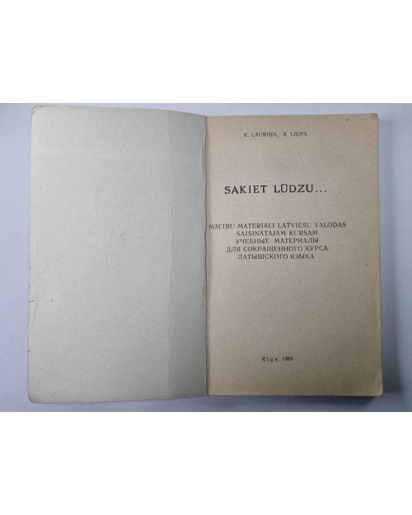 Sakiet, lūdzu! Macībe materiāli latviešu valodas saisinātajam kursam. 1.daļa (LAT/RUS)
